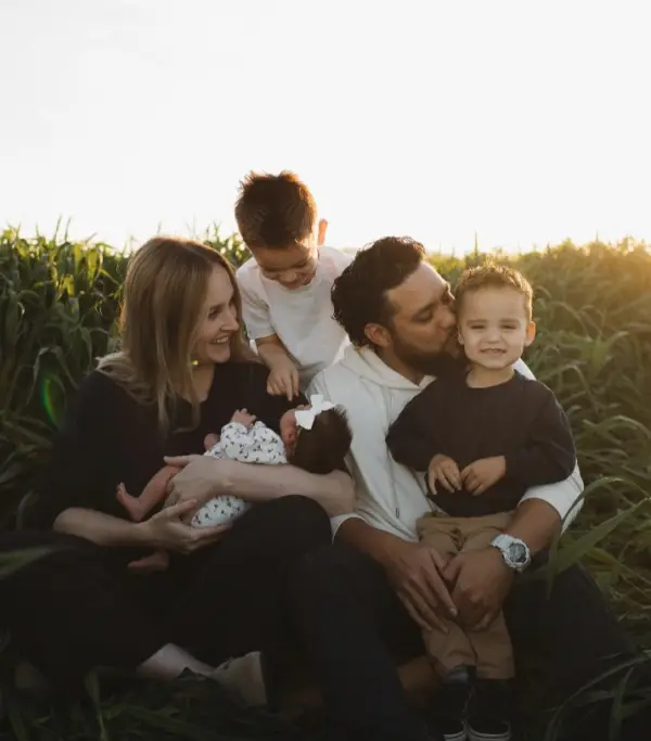 Ottley Pulotu with his wife and their three children